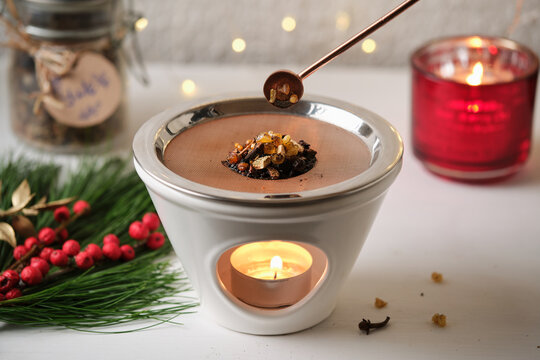 Christmas incense ritual - placing incense with a spoon