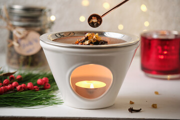 Christmas incense ritual - placing incense with a spoon