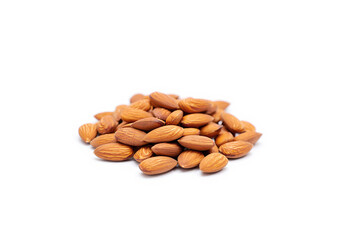 Organic almond nuts on white background.