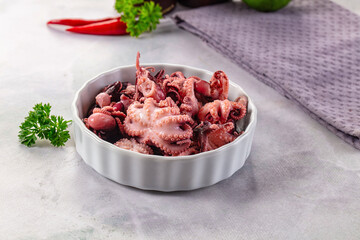 Marinated canned mini baby octopus