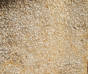 Light brown-beige stone texture. A background with a stone texture that can be copied for design.