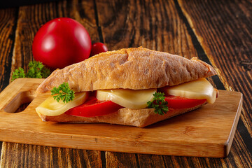 Sandwich with mozzarella and tomato