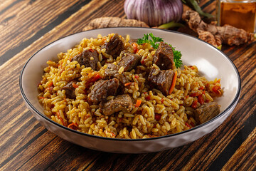 Asian traditional pilaf with beef