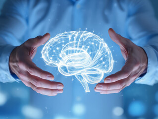 Hands cradle a glowing network-like brain symbolizing knowledge innovation and the future of thought.