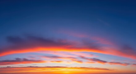 Fototapeta premium Dramatic Sunset Sky with Fiery Clouds