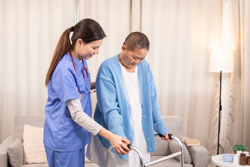 Obraz premium Young nurse assisting senior woman in walking with a walker, demonstrating caregiving, encouragement, and physical rehabilitation at home, healthcare, caregiver, medical, hospitality, recover.