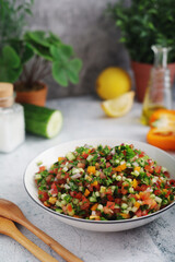 A bowl with traditional Israeli Salad