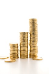 Stack of golden coins growing in height