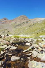 Weisseskar lake and mountaing spring on the way from Tiefenbach glacier to vent village, Oetztal valley, the Austrian Alps