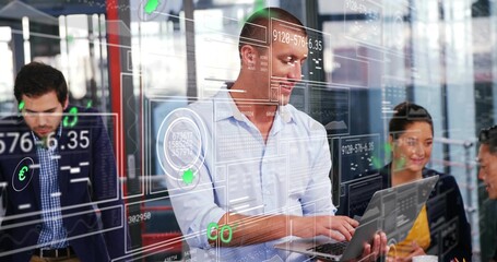 Collaborating data analysts wearing business attire typing on laptop and discussing data at office