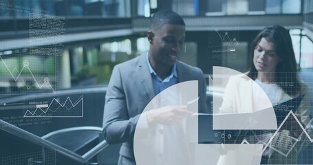 Pointing midcareer colleagues revealing trends on laptop at mezzanine atrium, with chart overlays