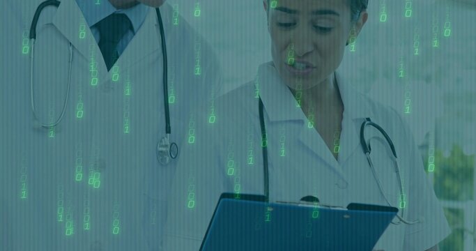 Doctors wearing white coats and stethoscopes examining tablet in clinic, with binary code overlay