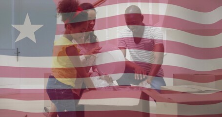 Obraz premium Family unpacking cardboard boxes and sorting items in living room, with white lampshade