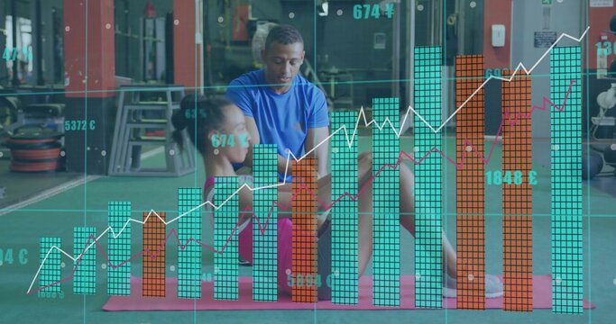 Fototapeta Kneeling trainer wearing athletic gear guiding client holding plank on red mat in gym with metrics