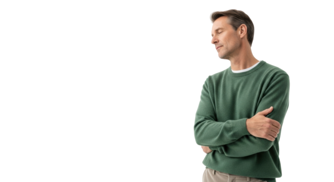 Caucasian man, mid-40s-50s, green sweater, beige trousers, arms folded, contemplative, against transparent studio background with copy space, concept of quiet introspection - Powered by Adobe
