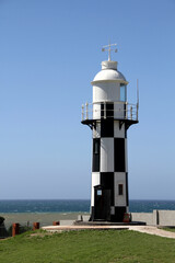 Lighthouse in Port Shepstone was retired of its duty in 1905 and replaced with an 8 meter high  circular iron tower. Erected at the Umzikulu river mouth