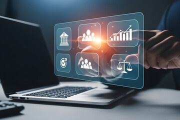 Digital holographic interface displays business and legal icons over laptop