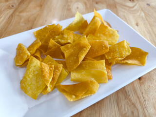 Crispy Fried Wonton Chips on a White Plate