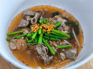 Bowl of Kway Tom yum Noodles with Pork