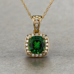 A radiant gold necklace, with a captivating green gemstone pendant, framed by sparkling diamonds, evokes timeless elegance.