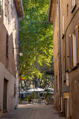Alley and houses in the old city Salernes leading to the market place. Department Var, Provence, France