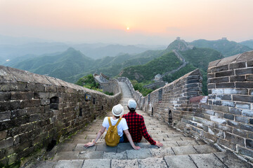 Travel tourists people sightseeing in China travel vacation. Happy interracial couple enjoying...