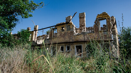 ruined street and destroyed houses the city Kiev war in Ukraine