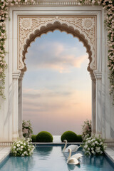 Two elegant swans in a reflecting pool in front of a beautifully carved floral marble arch overlooking the sea at dusk.