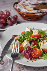 Fresh salad with cheese and tomatoes
