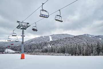 Chairlift at a mountain ski resort.
