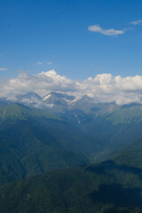 Naklejka premium mountain landscape with clouds