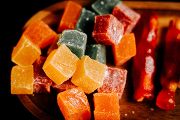 Delicious assortment of colorful Turkish delights served on a wooden platter