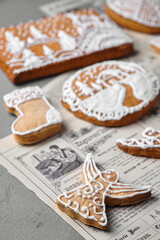 Christmas gingerbread cookies on vintage newspaper