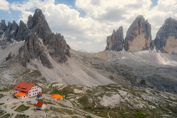 high mountain landscape in the alps with a refuge at Tre time di lava redo
