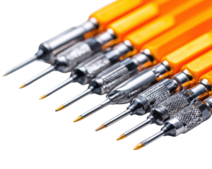 Close-up of a Set of Precision Screwdrivers with Orange Handles Against Black Background