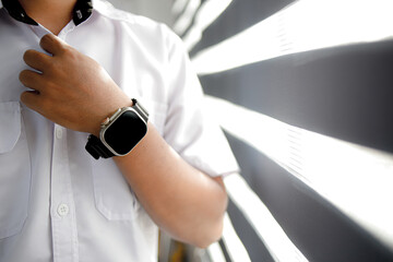Businessman wearing smartwatch technology gadget