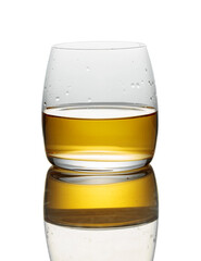 Whiskey in a glass on a white background.