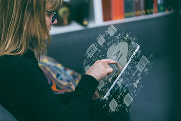 A woman uses a laptop and smartphone, showcasing AI-powered cloud computing. Integration of...