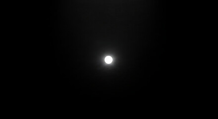 An elegant, minimalist video showcasing a vibrant, glowing point of light.