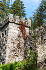 The towers of a castle ruins from the medieval times.