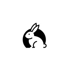 Obraz premium Elegant minimalist rabbit logo in black and white vector design, representing purity, harmony, and graceful professional modern branding identity