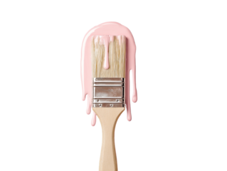 Paintbrush dripping with a pale pink liquid