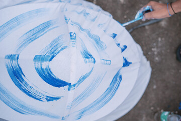 Creative painting with blue brush strokes