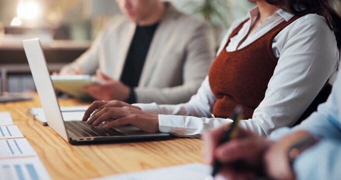 Hands, laptop and typing with business people in boardroom for meeting or upskill workshop. Computer, notes and seminar with employee team at table in office together for development or training