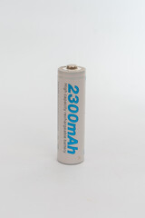 A white rechargeable battery with blue text, isolated on a clean white background, symbolizing...