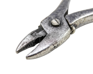 Close-up of Vintage Metal Pliers on Black Background