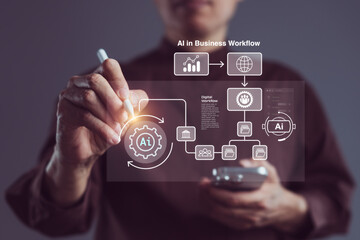 Businessman using stylus and smartphone to interact with AI-powered digital workflow interface for business process automation and innovative enterprise solutions