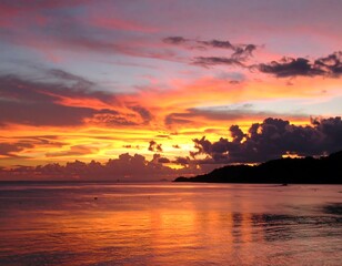 Vibrant sunset over calm water