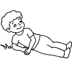 Young boy lying on green grass looking up at a blue sky