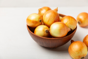 Onion on the kitchen table. onion slice. onion rings. Fresh Yellow Onion. Natural, fresh, vegetarian food. Agricultural products. Healthy eating. Vegetables. Farmer's market. Space for text.Copy space